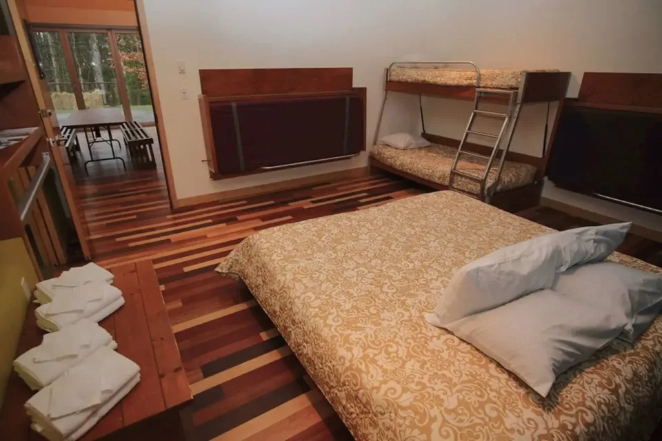 Cozy bedroom with bunk beds and wooden floors