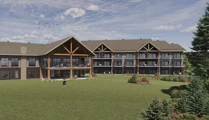 Large inn with balconies and lawn