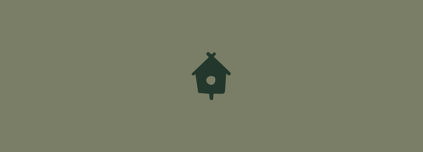 Icône minimaliste de nichoir d’oiseau vert